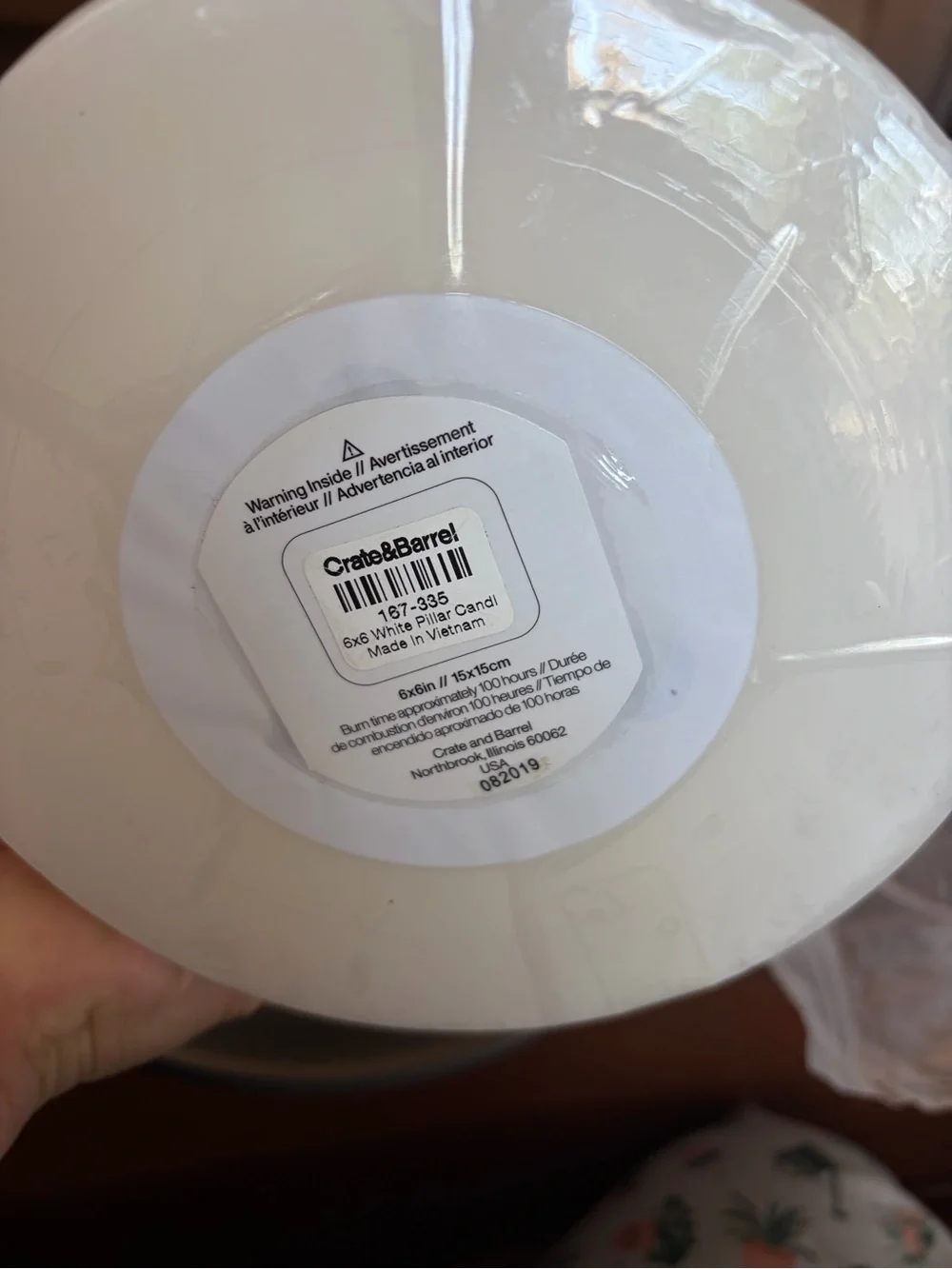 Crate&Barrel Matte Gray Stoneware Charger with Natural Rim and White candle
